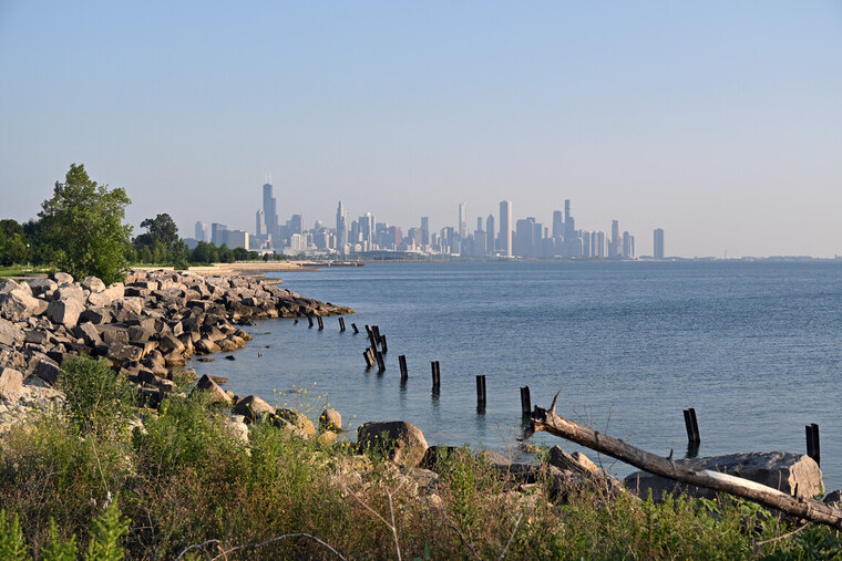 A photograph of a city skyline, the source